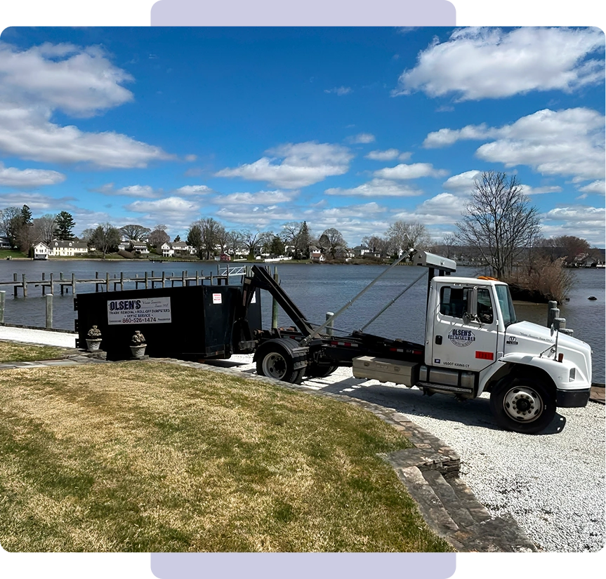White truck near a tranquil waterfront